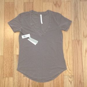 The Group by Babaton Foundation T-shirt NWT